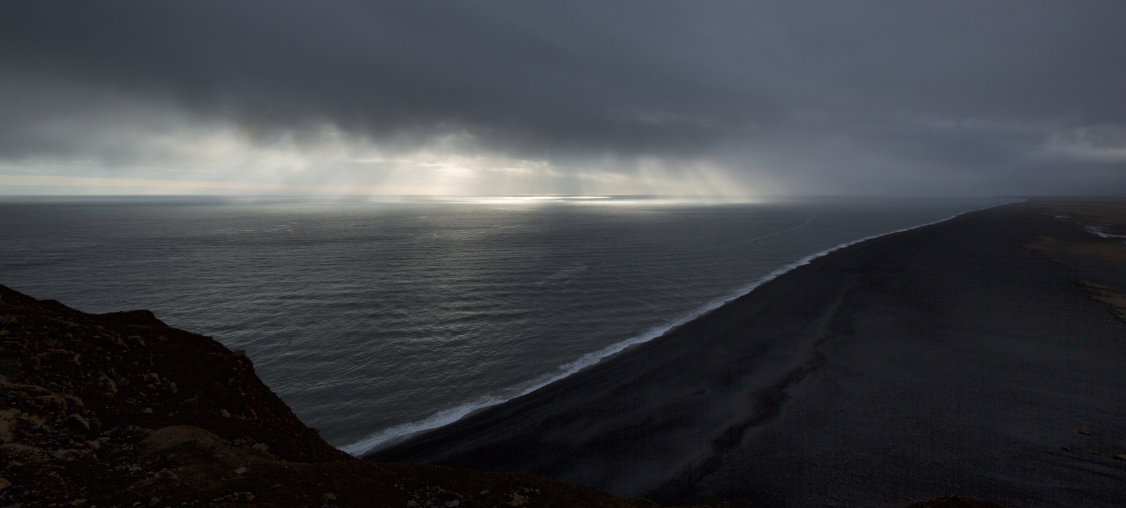 Lighthouse at Dyrhólaey Arch, Iceland 10