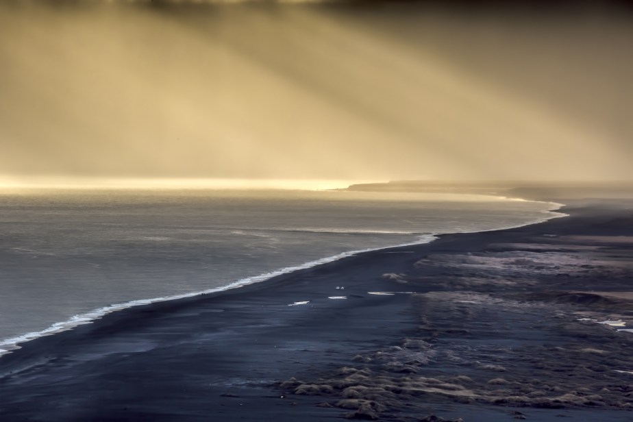 Lighthouse at Dyrhólaey Arch, Iceland 11