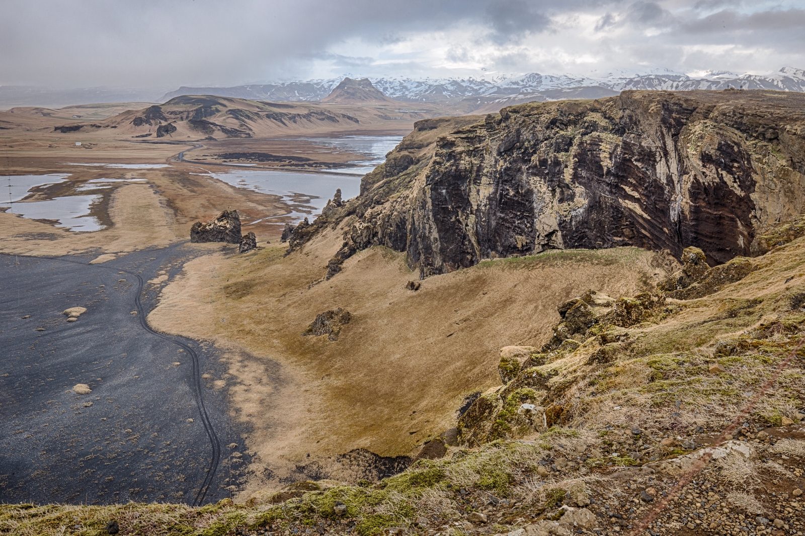 Lighthouse at Dyrhólaey Arch, Iceland 6