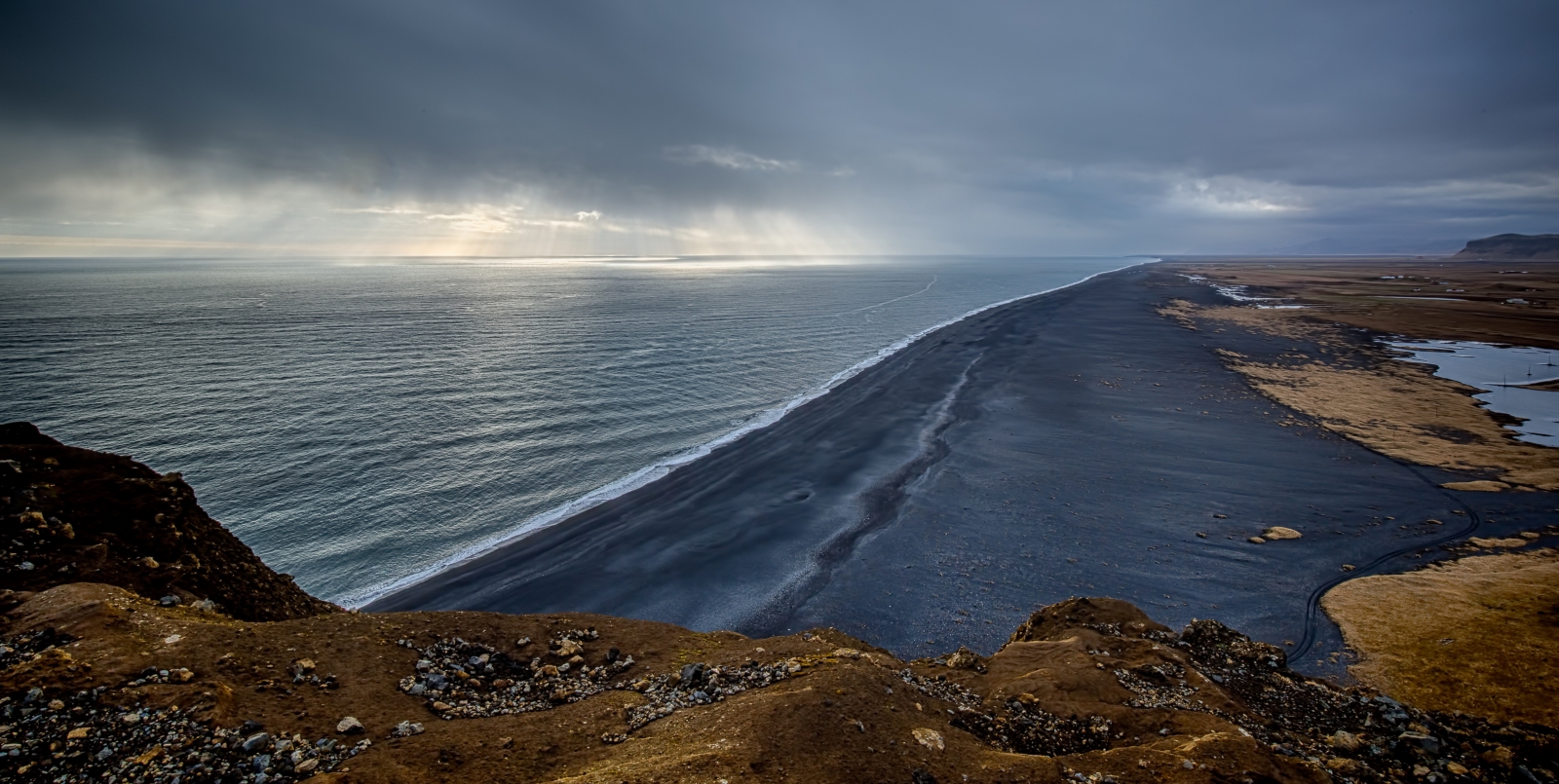 Lighthouse at Dyrhólaey Arch, Iceland 9