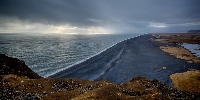 Lighthouse at Dyrhólaey Arch, Iceland 9